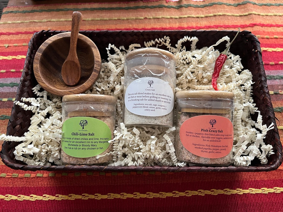 Crazy Salts Trio — Crazy Salt, Pink Crazy Salt, and Chili-Lime Salt hand-packed in a wicker basket with raffia