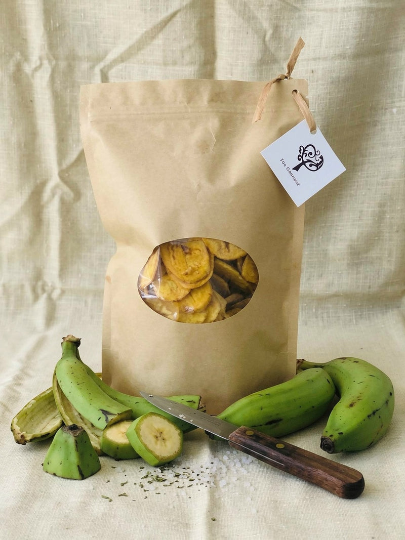 Fox Gourmet Plantain Chips kraft bag with fresh green plantains